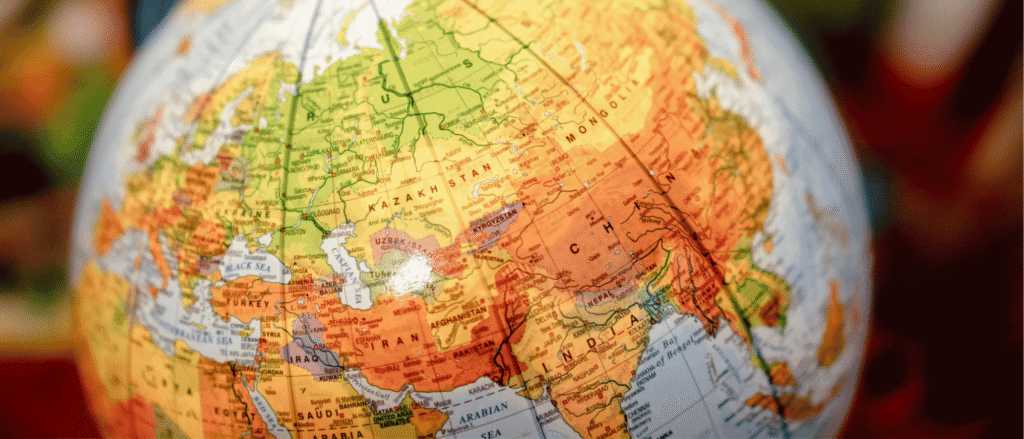 Close-up of a world globe, representing diversification across countries and regions