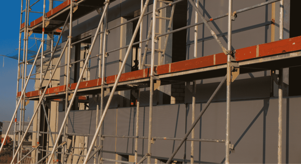 Scaffolding supporting a building under construction, a reminder that a retirement plan needs support to absorb market losses